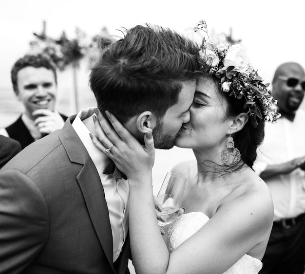 Wedding couple kissing each other