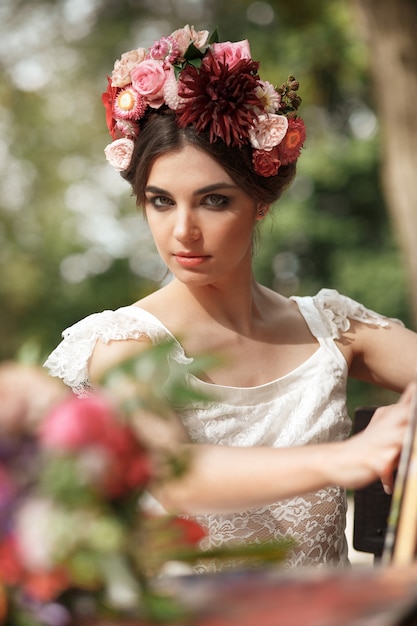 Wedding decoration in the style of boho, floral arrangement, decorated table in the garden.