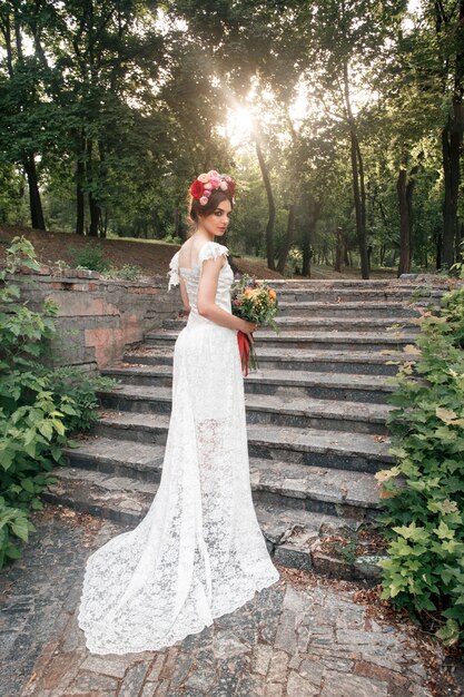 Wedding decoration in the style of boho, floral arrangement, decorated table in the garden.