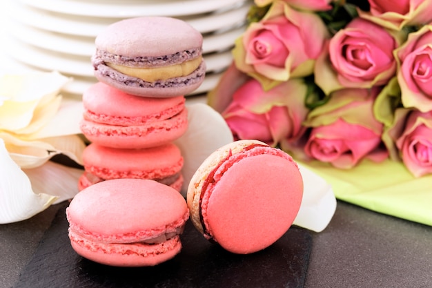 Wedding dessert with macaroons, coffee and strawberry
