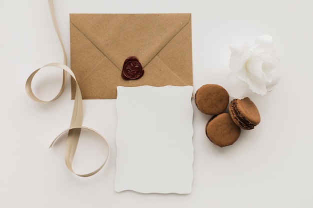 Free photo wedding envelope with macaroons