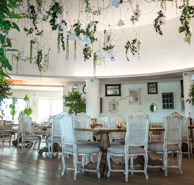 Wedding hall with white wooden furniture interior