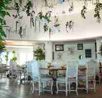 Free photo wedding hall with white wooden furniture interior