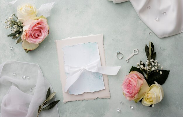 wedding invitation with ornaments beside
