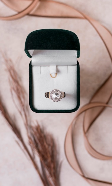 Free photo wedding ring and box top view