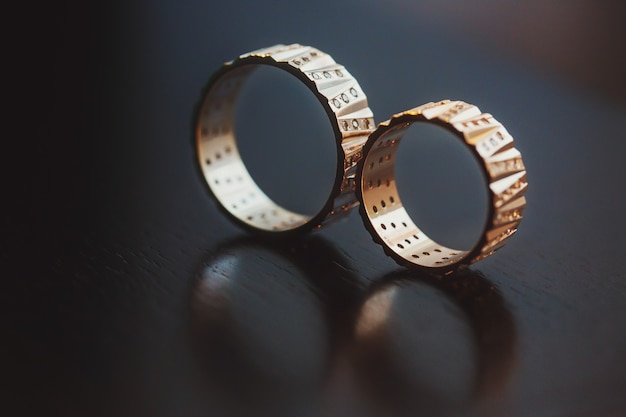 Wedding rings captured with a reflection in a surface