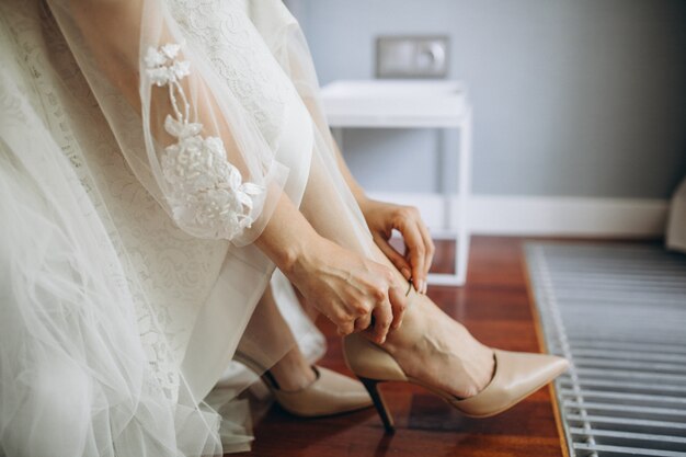 Wedding shoes on a bride on her wedding day