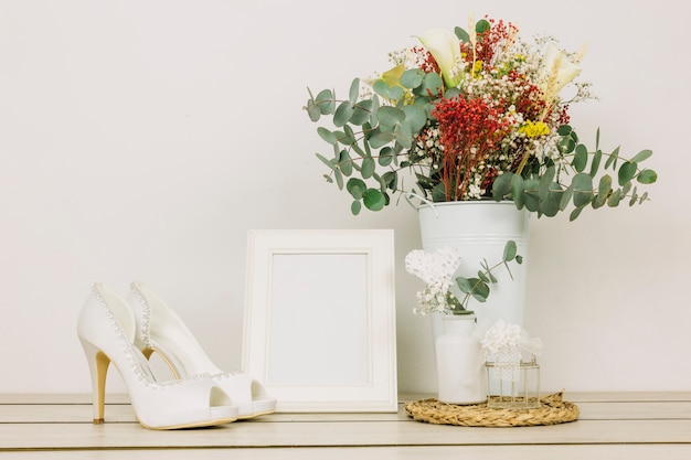 Free photo wedding shoes with flowers