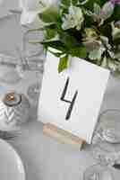 Free photo wedding table arrangement with flowers high angle