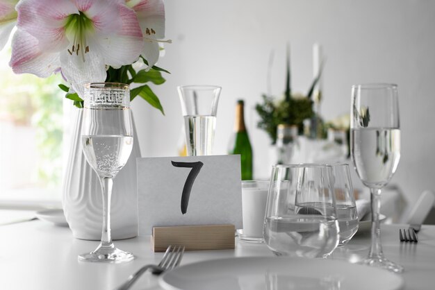 Wedding table arrangement with glasses