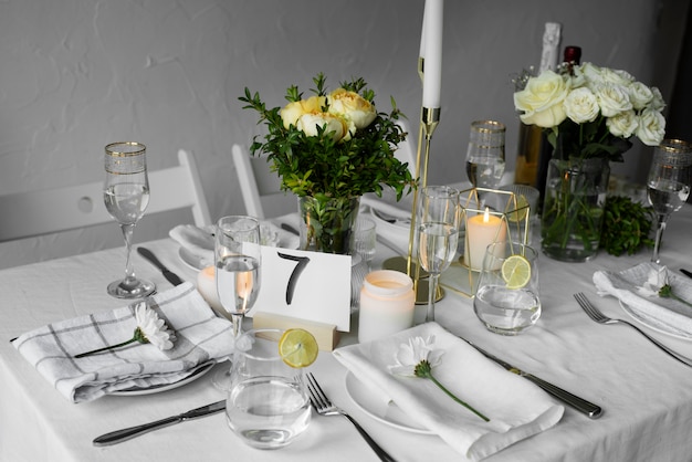 Wedding table arrangement with plants high angle