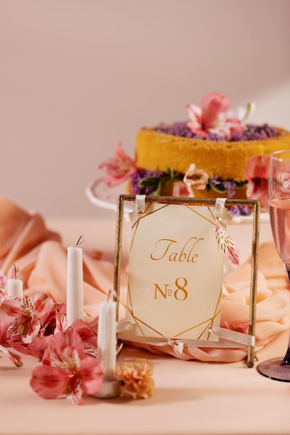 Free photo wedding table number with cake