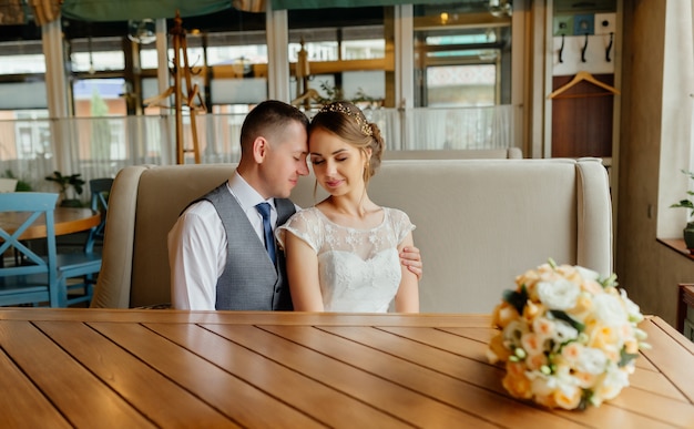 Wedding. Wedding day. Beautiful bride and elegant groom puffed. 