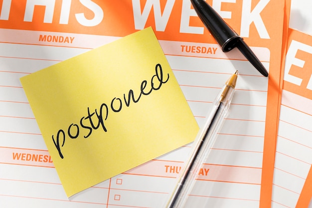 Free photo week agenda with postponed message