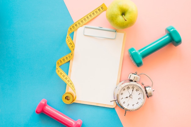 Weight loss composition with clipboard and clock