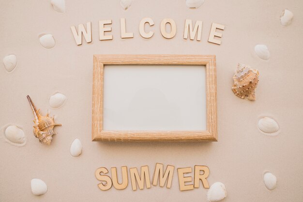 Welcome summer lettering and white chalkboard