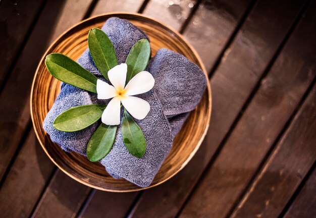 Welcome towels decorated with plumeria flowers