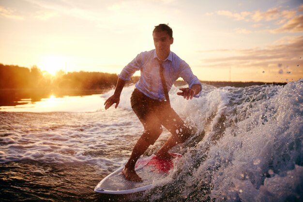 Well-dressed surfboarder