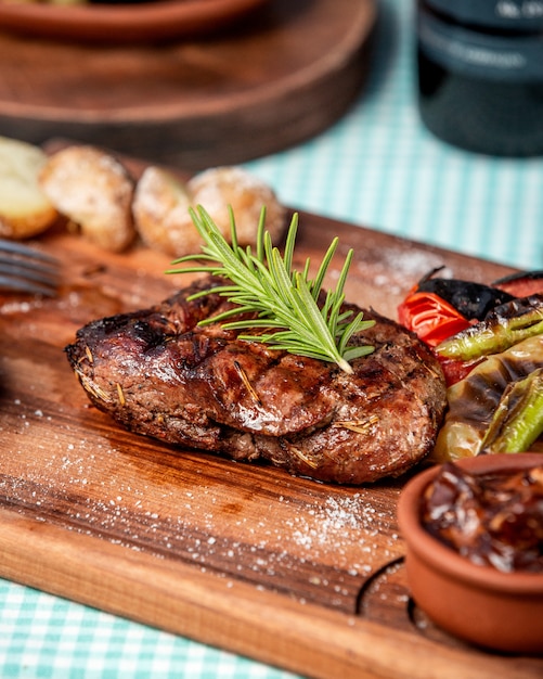 Well-fried steak with baked potatoes