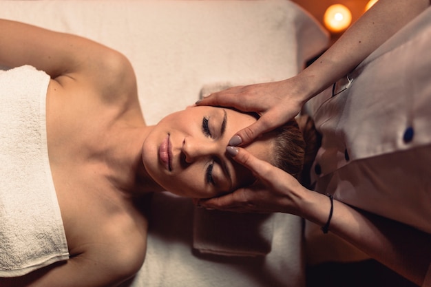 Wellness concept with woman in massage salon