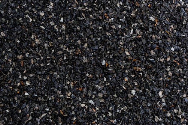 Free photo wet dark granite gravel textured