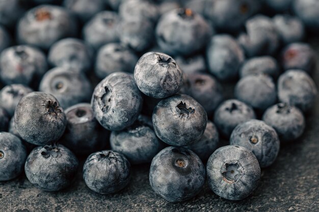 Wet ripe blueberries close up macro shot