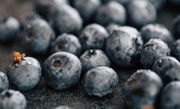 Wet ripe blueberries close up macro shot