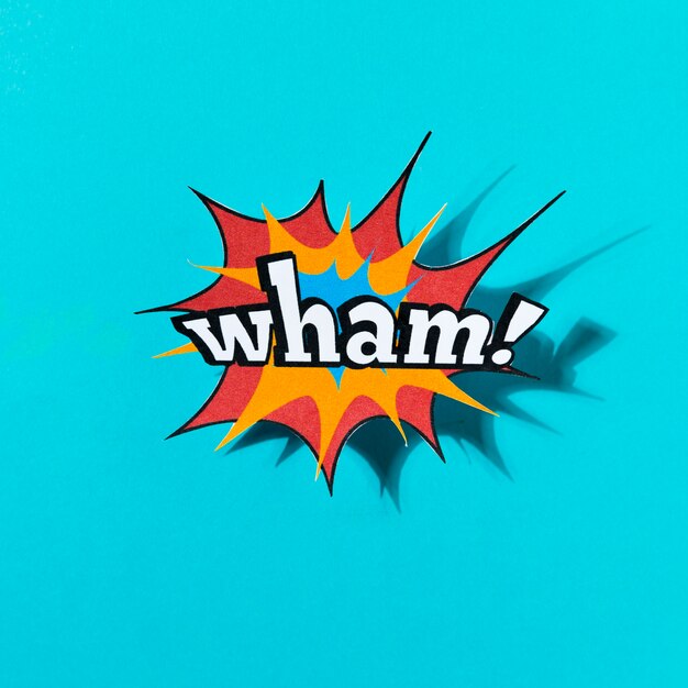 wham word comic book effect on blue background