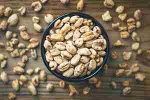 Free photo wheat grains in bowl and wheat popcorn in bowl, wheat seed rustic