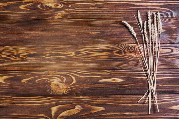 Wheat on wooden surface