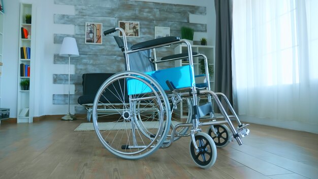 Wheelchair for disabled patient in empty room