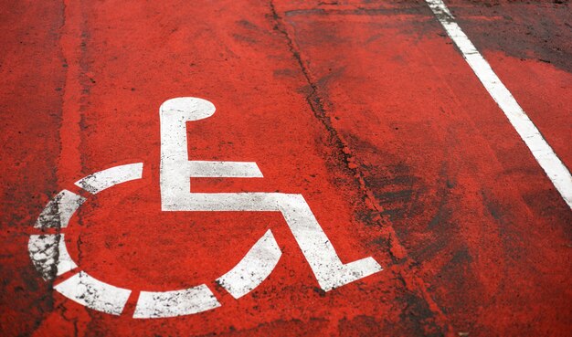 Wheelchair sign on the road in the city