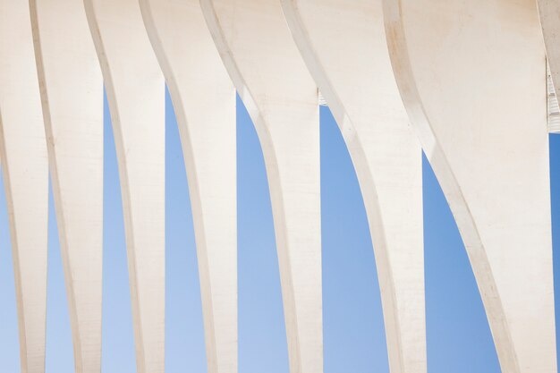 White abstract architectural detail against blue sky