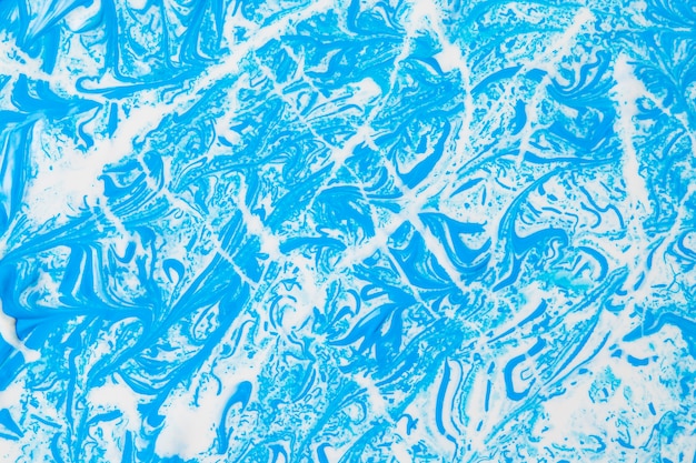 White abstract lines and stains on blue