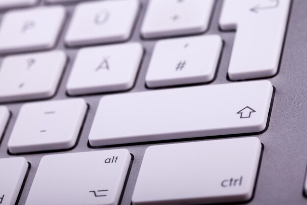 White aluminum keyboard in close up. Technology and communication