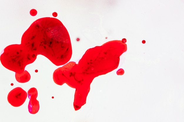 White background with abstract blood stains