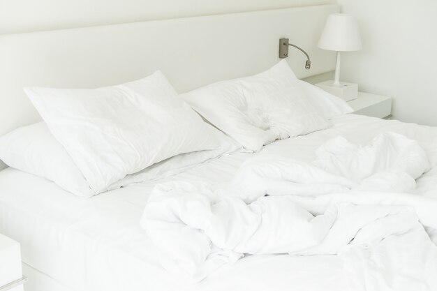 White bed unmade