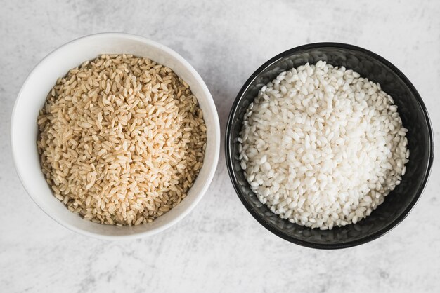 White and black bowls with grains