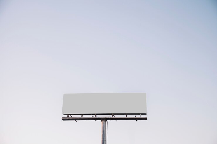 Free Photo white blank billboard against blue sky