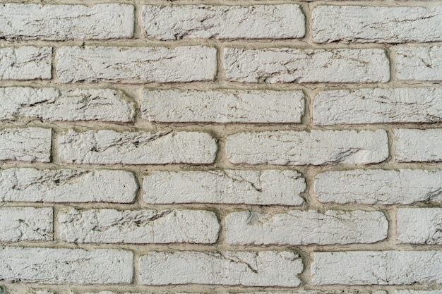 White brick wall. Texture of brick with white filling