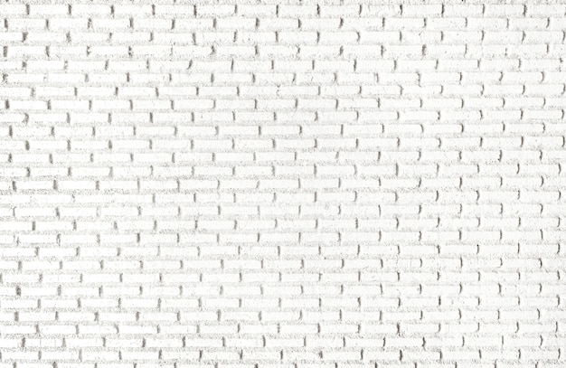 Free photo white brick wall textured wallpaper