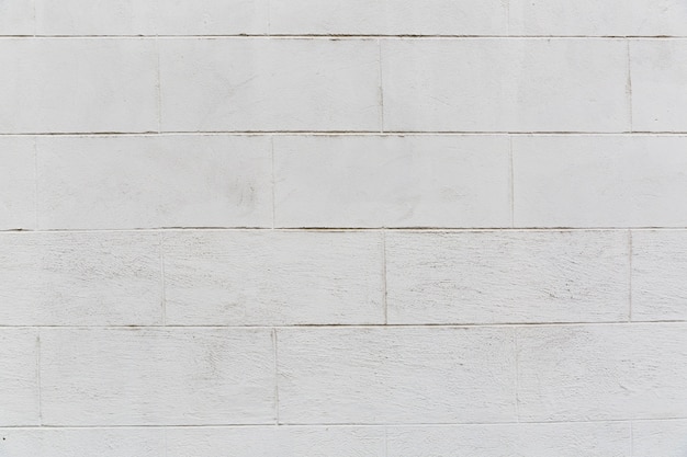 Free photo white brick wall with coarse appearance