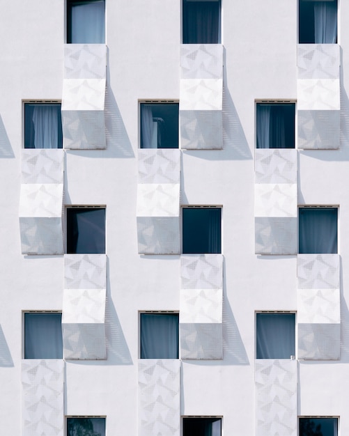 Free photo white building with blue windows