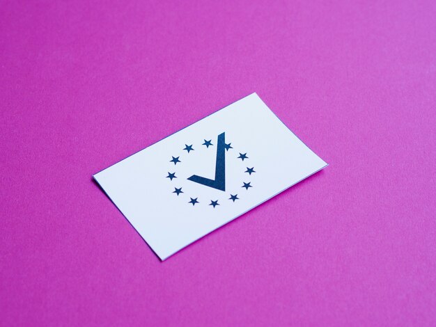 White card with european flag on purple background close-up