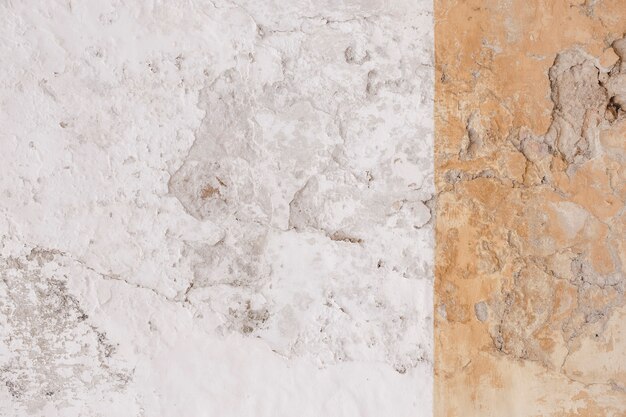 Белая цементная стена с фоном текстуры пресс-формы