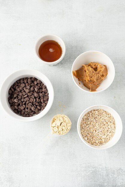 white ceramic bowls with baking ingredients