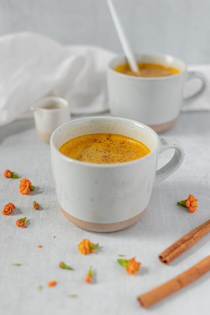 White ceramic cup with brown liquid