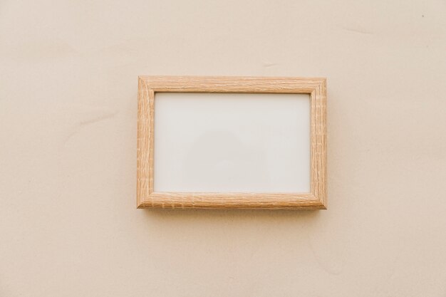 White chalkboard on sand