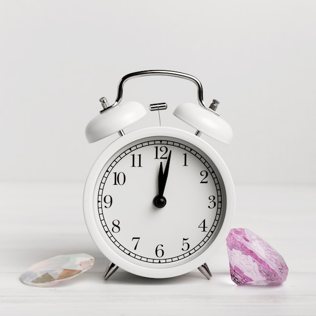 White clock with beautiful sea shells