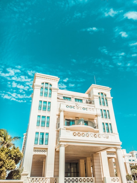 White concrete building with balconies